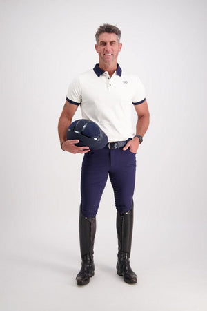 Gallant Equestrian Mens Equestrian Polo Shirt worn by a model, featuring a tailored slim fit, contrast collar, and cuffs; paired with navy Breeches