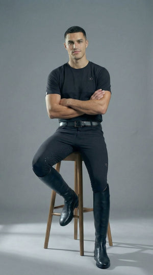 Black men's short sleeve tee made from recycled polyester and spandex with a tailored, breathable fit