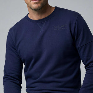 Navy men's sweatshirt with slim-fit design made from loop-backed cotton and spandex for breathable comfort and versatile style