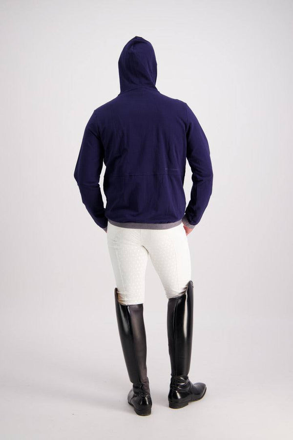 Back view of person wearing Gallant Equestrian Mens Equestrian Hoodie in navy, paired with bone jodhpurs and black riding boots.