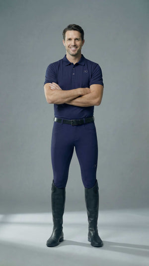 Navy mens breeches with knee-only silicone grip and mid-rise close-fitting design for equestrian use