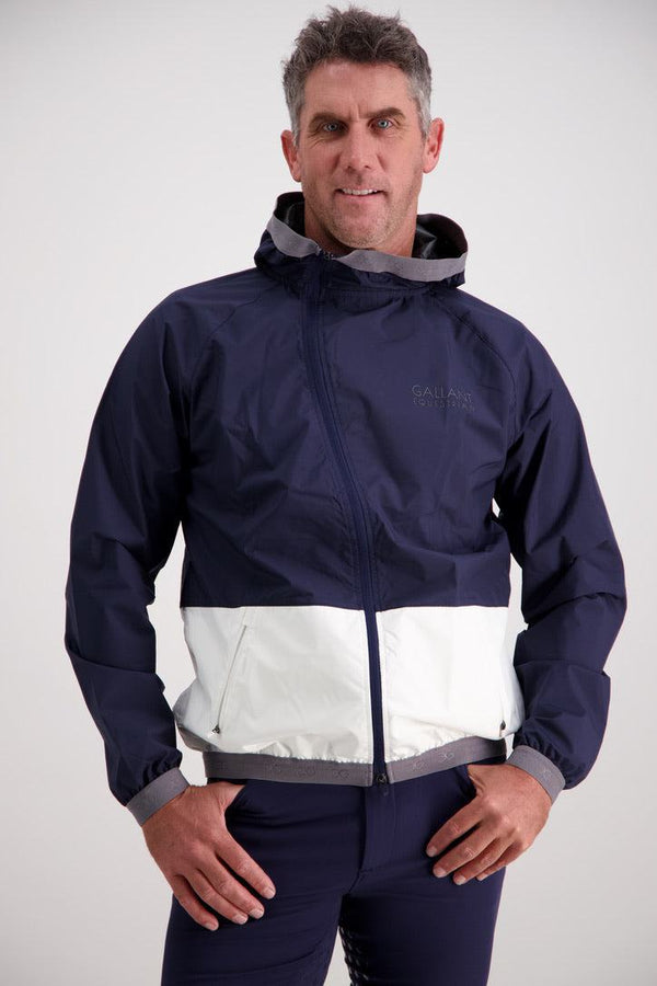 Lightweight Gallant Equestrian Mens Equestrian Rain Jacket with asymmetrical zip, navy and bone color, worn by model.