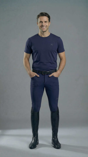 Navy men's full-seat breeches with mid-rise fit, grip, pockets, and lockdown zips for riding performance