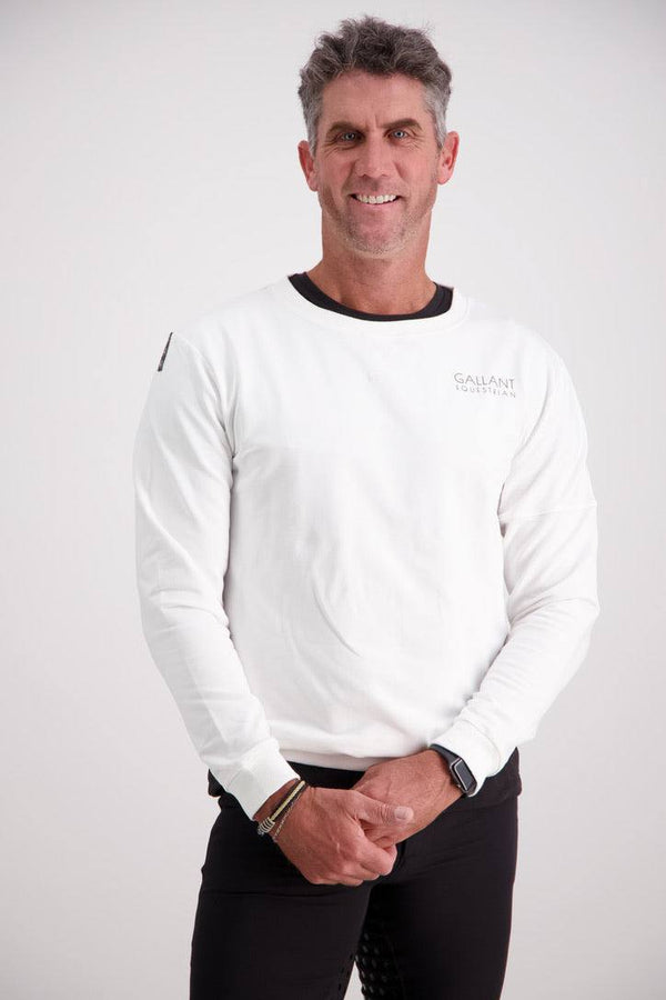 Man wearing Gallant Equestrian Mens Sweatshirt in white, loop-backed cotton fabric for comfort.