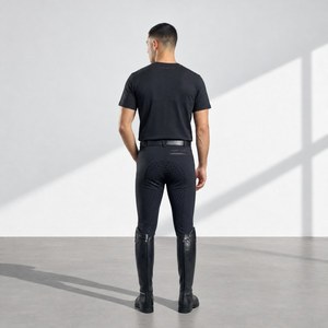 Mens Breeches in black stretch fabric, featuring a full-seat grip with dotted silicone pattern and fitted legs.