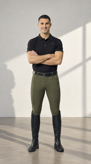 Olive mens breeches full seat in stretch fabric, with a close fit and black knee-high riding boots.
