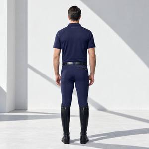 Mens Breeches in navy stretch fabric, shown from behind with silicone knee grip patches and a fitted design.