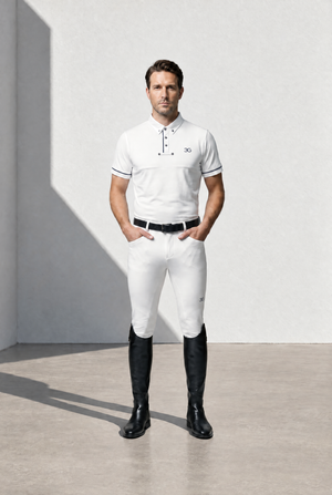 Mens Competition Breeches in white stretch fabric, fitted with subtle knee grip panels and worn with tall black riding boots.