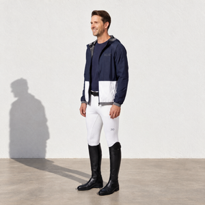Mens Equestrian Rain Jacket in navy lightweight fabric with white color-block panels, hood and front zip closure.
