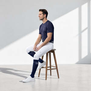 Mens Riding Socks in navy, knee-high with a smooth stretch shaft and subtle white logo detail at the cuff.