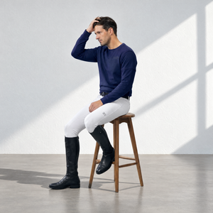 Mens Sweatshirt in solid navy cotton with a crew neck, long sleeves and subtle chest logo, paired with white breeches.